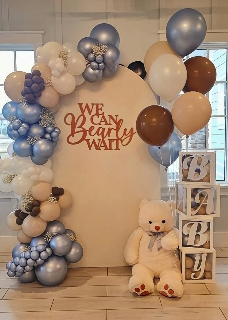 Blush and gold balloon arch for a baby shower