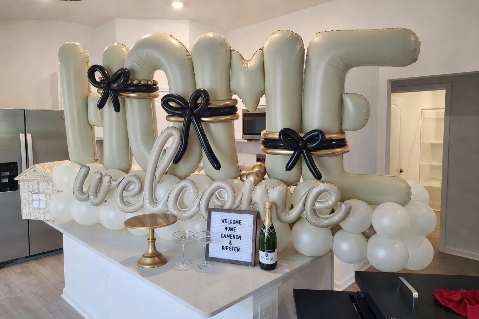 Balloon setup for a welcome home celebration